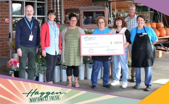 Haggen donates a check to Chinook Enterprises